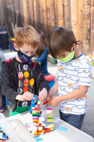 Learning through play helps children develop problem solving skills as they learn to work together.